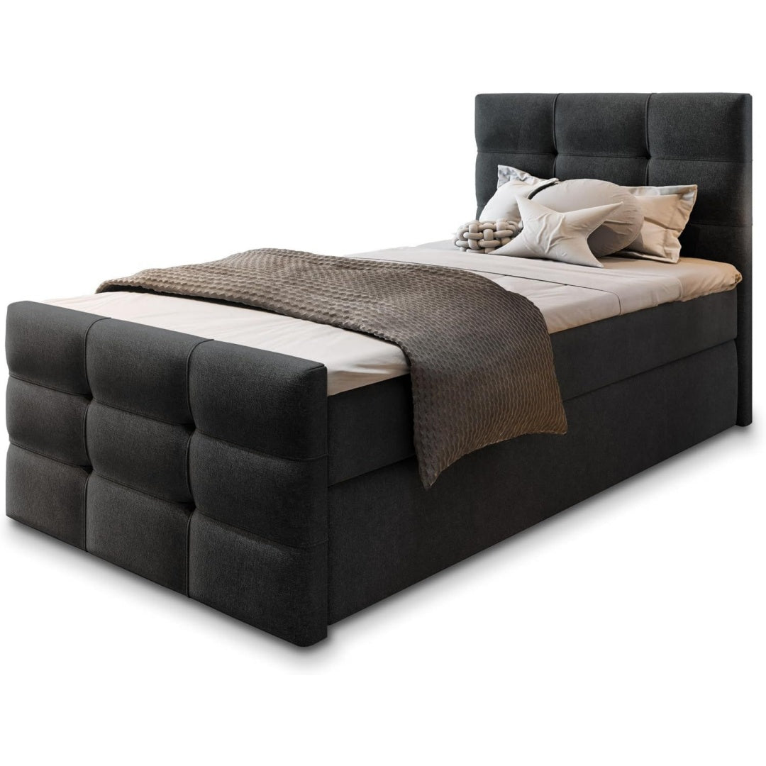 Ein Bettkasten an dem Boxspringbett